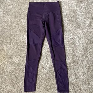 Purple workout leggings.